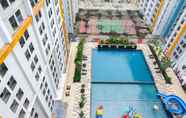 Swimming Pool 5 Cozy Studio Apartment at 11th Floor Paramount Skyline By Travelio