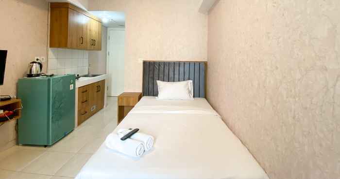 Bedroom Fully Furnished Studio Apartment at Springlake Summarecon Bekasi near Mall By Travelio