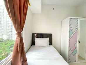 Bedroom 4 Elegant and Comfy 2BR Apartment at Springlake Summarecon Bekasi near Summarecon Mall By Travelio