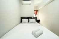 Kamar Tidur Elegant and Comfy 2BR Apartment at Springlake Summarecon Bekasi near Summarecon Mall By Travelio