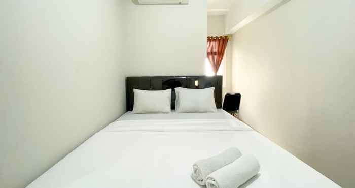 Bedroom Elegant and Comfy 2BR Apartment at Springlake Summarecon Bekasi near Summarecon Mall By Travelio