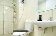 In-room Bathroom 5 Elegant and Comfy 2BR Apartment at Springlake Summarecon Bekasi near Summarecon Mall By Travelio