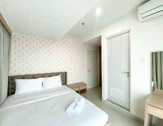 Bedroom 2 Fancy and Nice 3BR Apartment at Grand Kamala Lagoon By Travelio