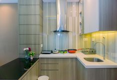 Common Space 3 Fancy and Nice 1BR Apartment at Brooklyn Alam Sutera By Travelio