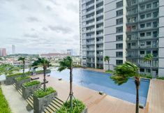 Swimming Pool 6 Simply Designed Studio Apartment at Daan Mogot City By Travelio