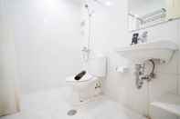 In-room Bathroom Homey 2BR with Extra Room Apartment at Taman Beverly By Travelio