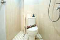 In-room Bathroom Minimalist Studio Apartment at 12th Floor Grand Kamala Lagoon By Travelio