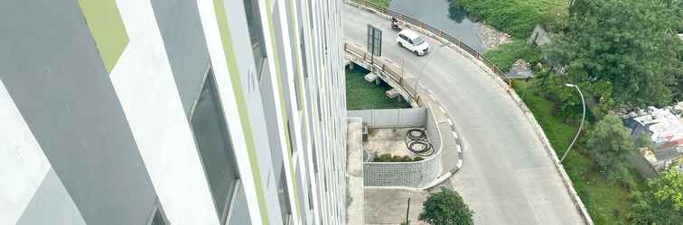 Lobi Minimalist Studio Apartment at 12th Floor Grand Kamala Lagoon By Travelio