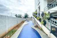 Swimming Pool Minimalist Studio Apartment at 12th Floor Grand Kamala Lagoon By Travelio