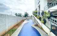 Kolam Renang 4 Minimalist Studio Apartment at 12th Floor Grand Kamala Lagoon By Travelio