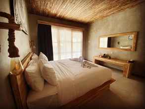 Bilik Tidur 4 Golden Garuda Cottages