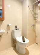 BATHROOM Cozy Apartment Studio at Oasis Cikarang By Travelio