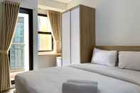 Bedroom Minimalist Studio Apartment at Transpark Cibubur By Travelio