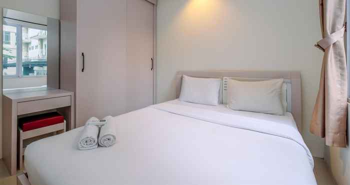 Kamar Tidur Homey and Modern Look 2BR Bogor Icon Apartment By Travelio