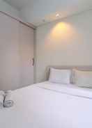 BEDROOM Homey and Modern Look 2BR Bogor Icon Apartment By Travelio