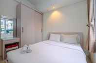 Bedroom Homey and Modern Look 2BR Bogor Icon Apartment By Travelio