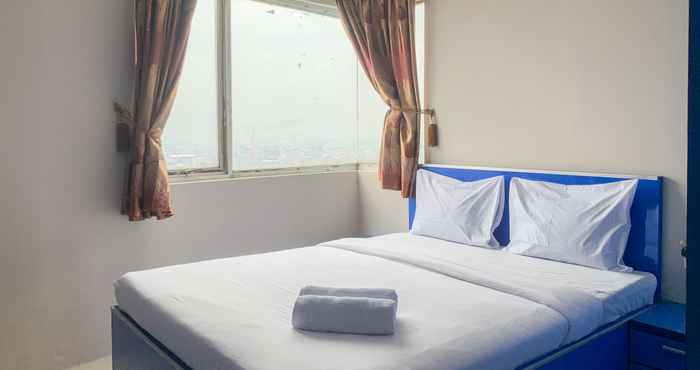 Bedroom Cozy 1BR Apartment at Green Central City Glodok By Travelio
