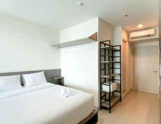 Bedroom 2 Enjoy Living Studio Room Apartment at High Floor Grand Kamala Lagoon By Travelio