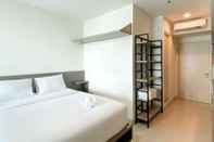 Bedroom Enjoy Living Studio Room Apartment at High Floor Grand Kamala Lagoon By Travelio