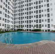 Kolam Renang 4 Simply and Well Furnished Studio at Serpong Garden Apartment By Travelio