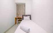 Bedroom 2 Well Designed 2BR Apartment at Corner Transpark Cibubur By Travelio