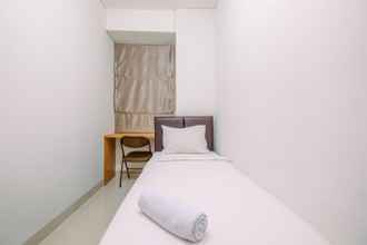 Bedroom 4 Well Designed 2BR Apartment at Corner Transpark Cibubur By Travelio