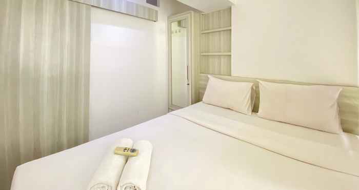Kamar Tidur Modest 2BR Apartment at Jarrdin Cihampelas By Travelio