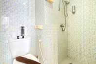 In-room Bathroom Modest 2BR Apartment at Jarrdin Cihampelas By Travelio