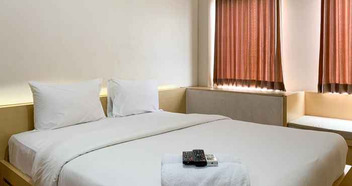 Kamar Tidur Relaxing Studio Apartment at Patraland Urbano By Travelio