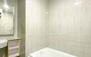 In-room Bathroom 4 Simple and Cozy Big Studio Vasanta Innopark Apartment By Travelio