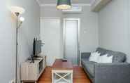 Lobi 7 Minimalist and Cozy 2BR Apartment at Pakubuwono Terrace By Travelio