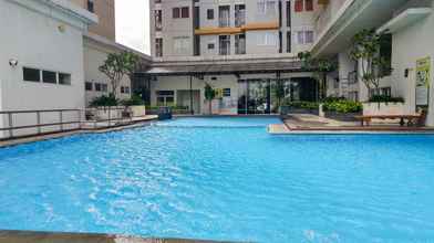 Kolam Renang 4 Minimalist and Cozy 2BR Apartment at Pakubuwono Terrace By Travelio