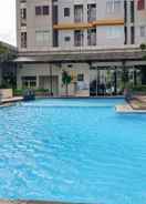 SWIMMING_POOL Minimalist and Cozy 2BR Apartment at Pakubuwono Terrace By Travelio