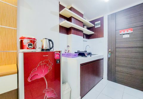 Lobby Elegant and Homey Studio Amazana Serpong Apartment By Travelio