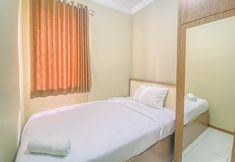 Bedroom 5 Relaxing 2BR Apartment at Grand Palace Kemayoran By Travelio