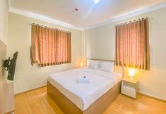 Bedroom 4 Relaxing 2BR Apartment at Grand Palace Kemayoran By Travelio