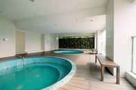 Swimming Pool Well Designed and Strategic Studio Apartment at Capitol Park Residence By Travelio