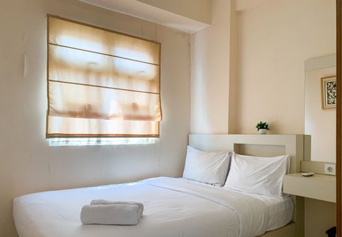 Bedroom Comfortable and Modern Look 2BR Green Pramuka City Apartment By Travelio