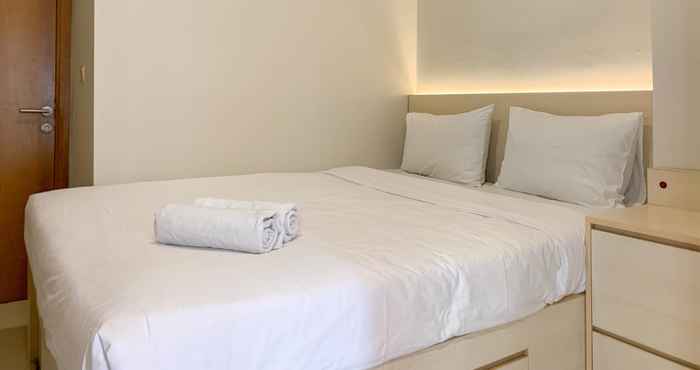 Bedroom Elegant and Lavish 1BR at The Mansion Kemayoran Apartment By Travelio