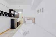 Kamar Tidur Modern Look Studio at M-Town Residence Apartment near SMS Mall By Travelio