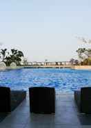 SWIMMING_POOL Full Furnished with Modern Design 1BR Apartment at West Vista By Travelio
