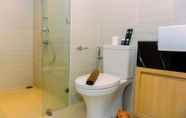 In-room Bathroom 7 Full Furnished with Modern Design 1BR Apartment at West Vista By Travelio