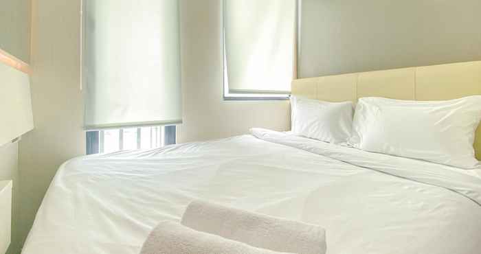 Bedroom Enjoy Living and Homey Studio Osaka Riverview PIK 2 Apartment By Travelio