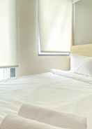 BEDROOM Enjoy Living and Homey Studio Osaka Riverview PIK 2 Apartment By Travelio