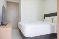 Kamar Tidur Cozy and Exclusive 1BR at Gold Coast Apartment By Travelio