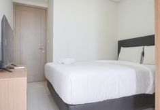 Bedroom 3 Cozy and Exclusive 1BR at Gold Coast Apartment By Travelio