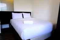 Kamar Tidur Homey 1BR at Gateway Ahmad Yani Cicadas Apartment By Travelio