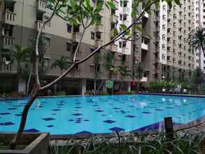 Hồ bơi 4 Homey 1BR at Gateway Ahmad Yani Cicadas Apartment By Travelio