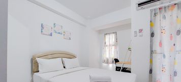 Bedroom 2 Nice and Fancy Studio at Urbantown Serpong Apartment By Travelio