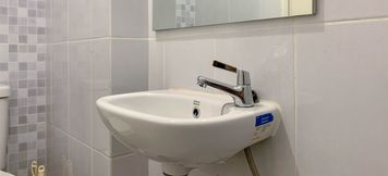 In-room Bathroom 4 Homey Studio Apartment at 20th Floor Tokyo Riverside PIK 2 By Travelio